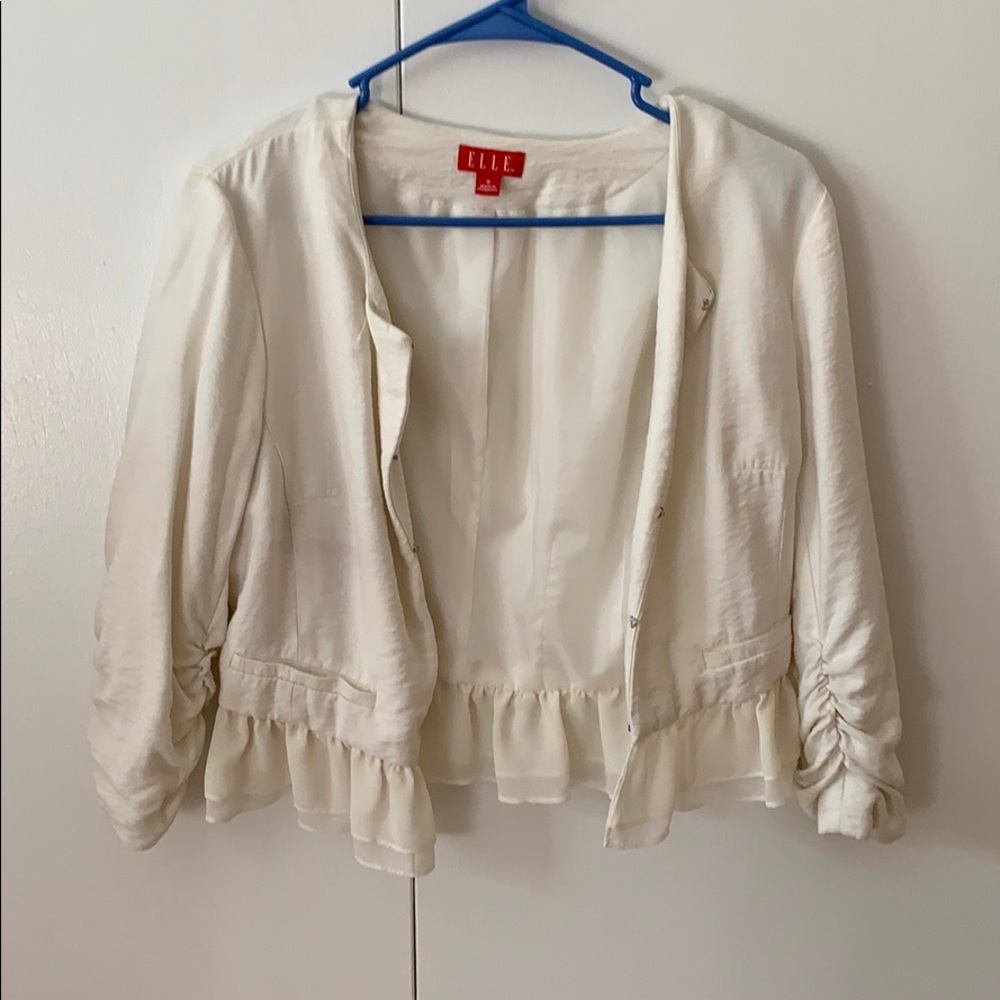 Cream blazer with ruffled hem